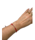 GOLD BRACELET WITH ORANGE SAPPHIRE BAR AND MACRAME